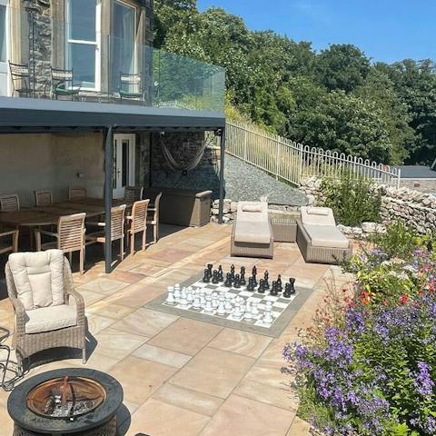 Deploy your best gambits on the giant outdoor chess table