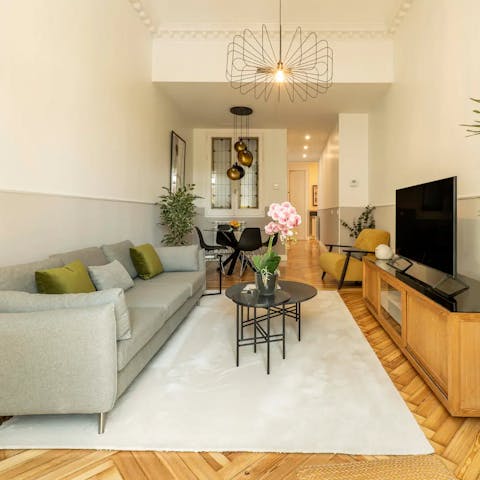 Relax in the elegant living area after a day of exploring the city 
