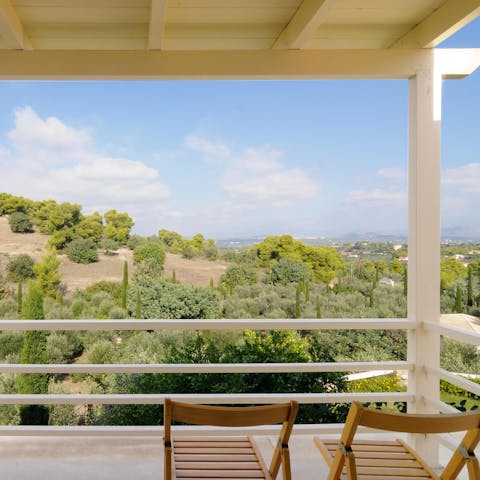 While away the hours looking out across the Greek hillside