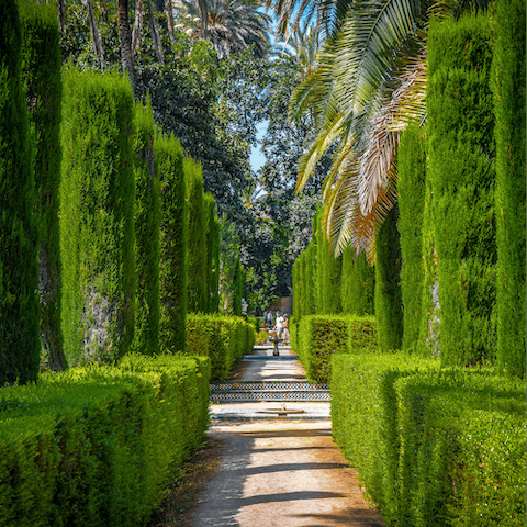 Wander the grounds of the Royal Alcázar of Seville, just over five minutes' walk away