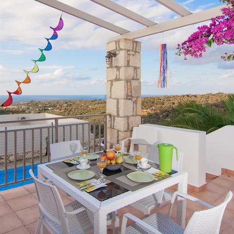 Nibble olives on the terrace as you wait for the barbecue to heat up