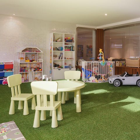 Let the kids run wild in the play room on the lower floor, filled with toys for all ages