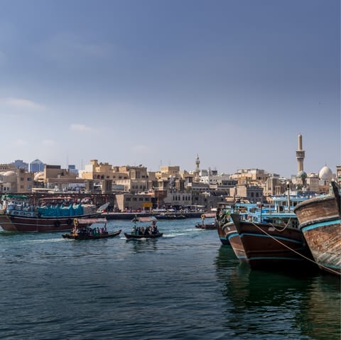 Take a tour of the Dubai Creek on a traditional-style, wooden dhow boat