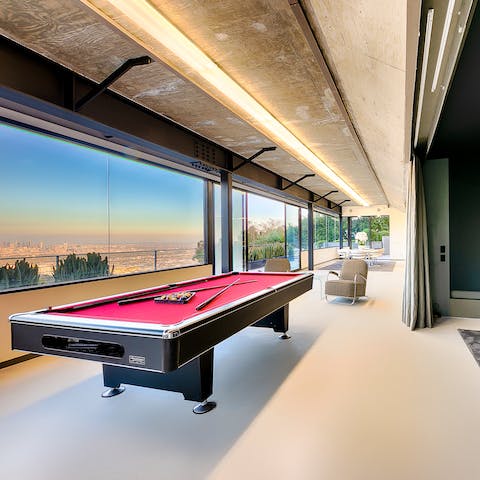 Shoot some pool in the entertainment room