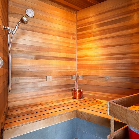 Unwind in the master bathroom's private sauna