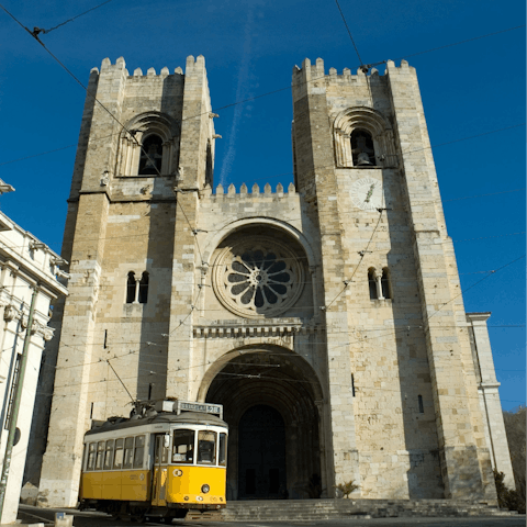 Visit the Sé de Lisboa, a five-minute stroll away