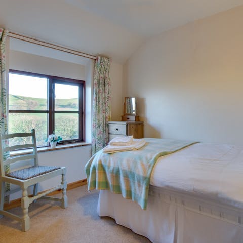 Wake up to picturesque rural views from the bedroom windows