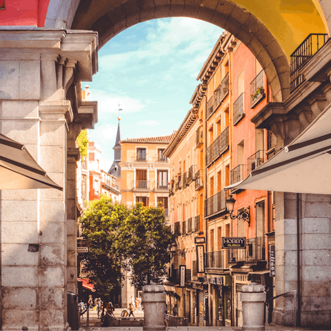 Stroll fifteen minutes to Plaza Mayor to revel in the atmosphere