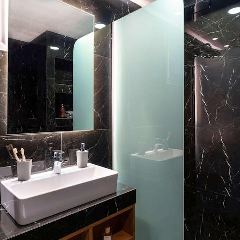 Pamper yourselves in the sleek marble bathrooms 