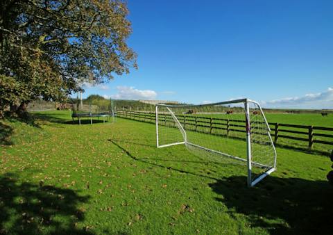 Let the kids run wild in the shared garden, complete with football goal and trampoline