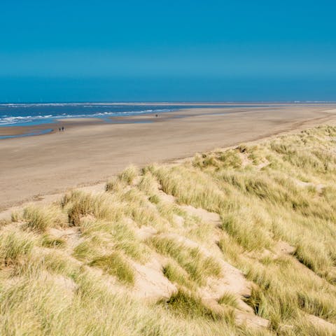 Drive forty minutes to reach the empty beaches of the Norfolk Coast