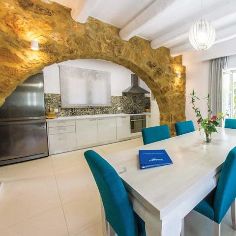 Admire the old-world features inside, like the stone archway above the kitchen