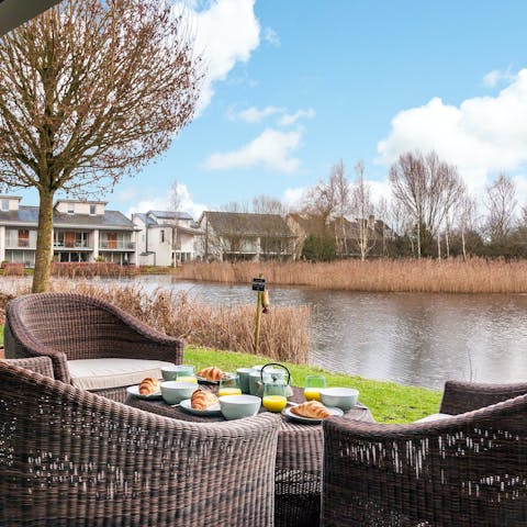 Sip your morning coffee from the terrace overlooking the lake