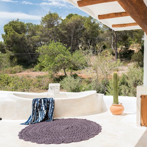 Feel a wonderful sense of wellbeing whilst soaking in the outdoor bath