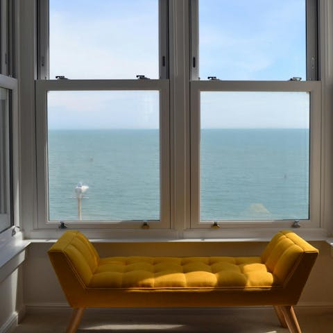 Admire the far-reaching sea views from the bay window