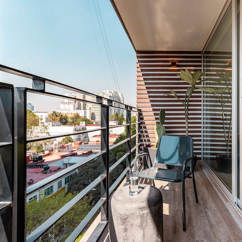 Look out over leafy, chic Polanco from your balcony