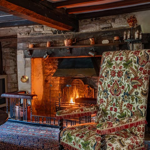 Spend cosy evenings relaxing with drinks by the fire 