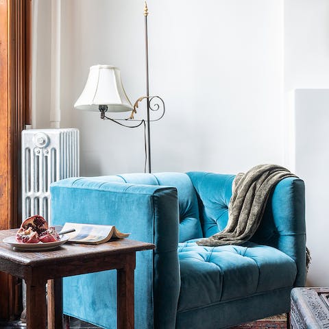 A velvet turquoise chaise
