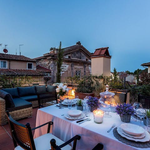 Dine alfresco with vistas over Lucca's rooftops
