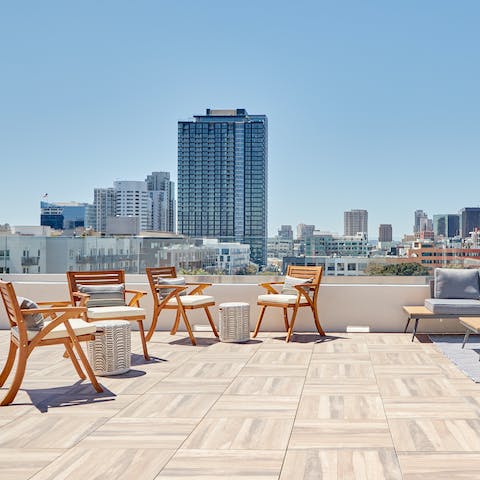 Make your way up to the communal rooftop patio for sunset views over the city