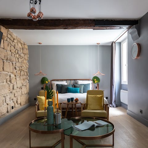 Rustic stone wall and exposed beam