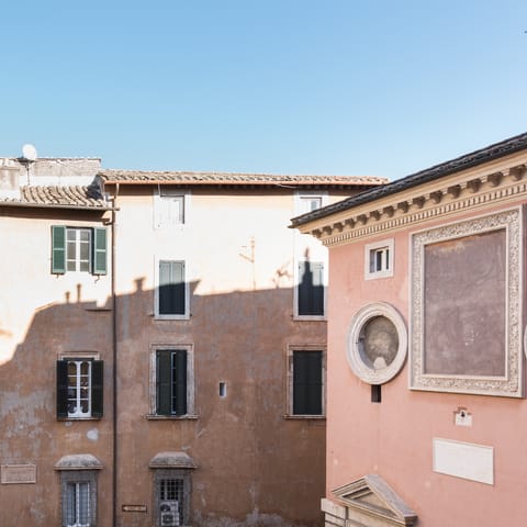 Look out over the beautiful Piazza delle Cinque Scole