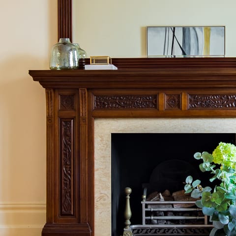 A Stunning carved wood fireplace