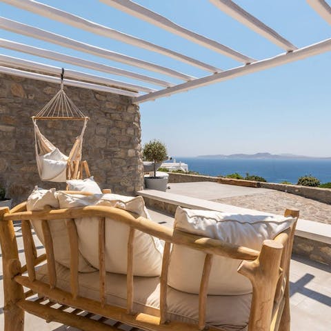 Enjoy your morning coffee looking out over the Aegean Sea