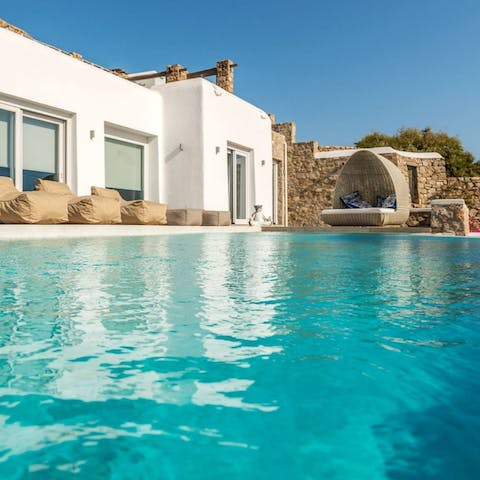 Take the plunge in the home's infinity pool
