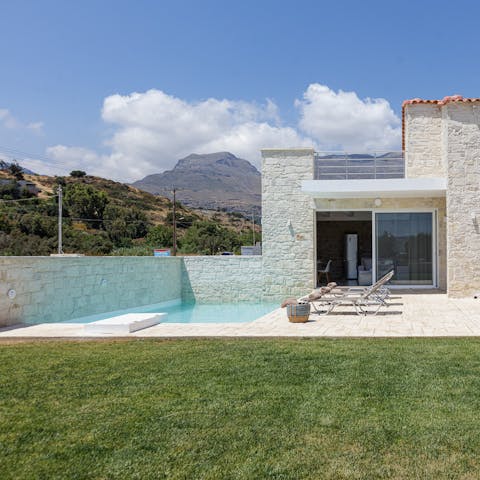 Plunge into the cooling waters of your pristine pool for a refreshing dip