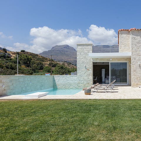 Plunge into the cooling waters of your pristine pool for a refreshing dip
