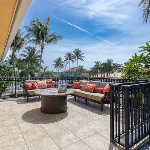 Splay out on the outdoor furnishings on the balcony