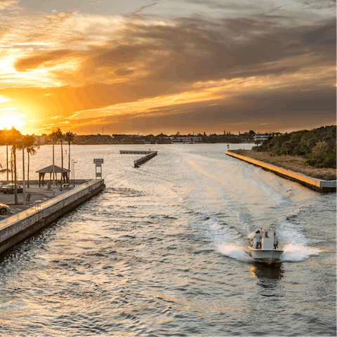 Use the boat lift on the deck to explore Lake Worth Lagoon