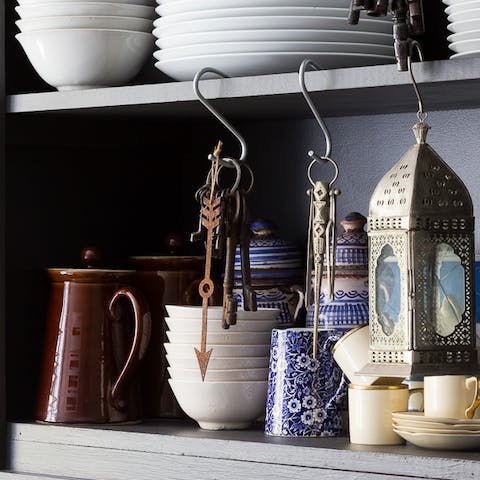 Admire the host's ornate trinkets and crockery