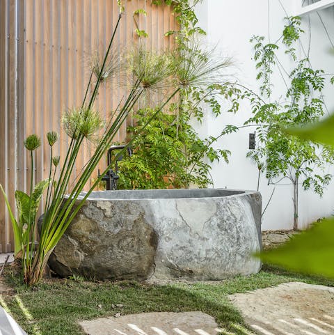 Soak in the outdoor bathtub