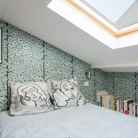 The loft bedroom and skylight