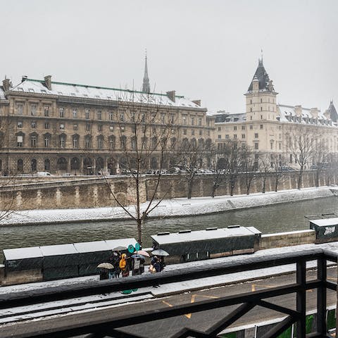 Wake up to charming Seine views from your bedroom window