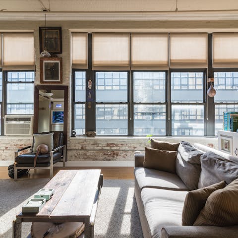 Bask in plenty of natural light thanks to the beautiful  industrial-style windows