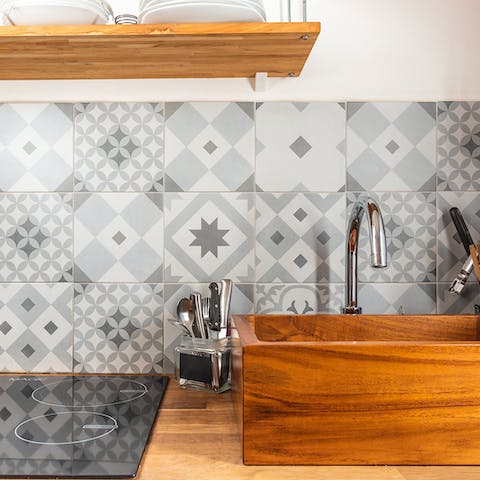 Quaint kitchen with a stylish tile mosaic