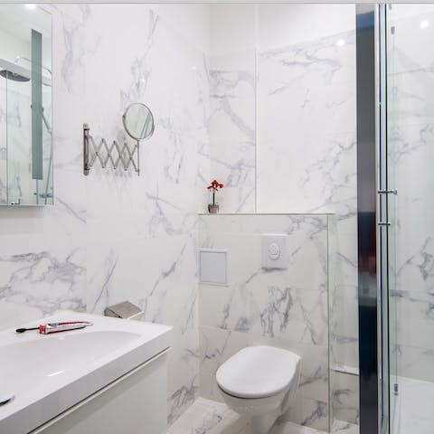 The clean white marble tiling