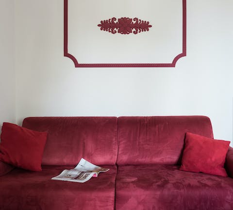 The red velvet sofa
