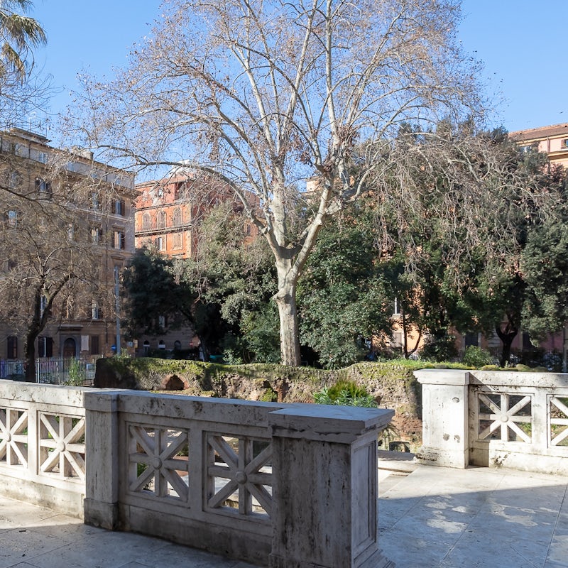 Step outside onto a beautiful green square outside the apartment