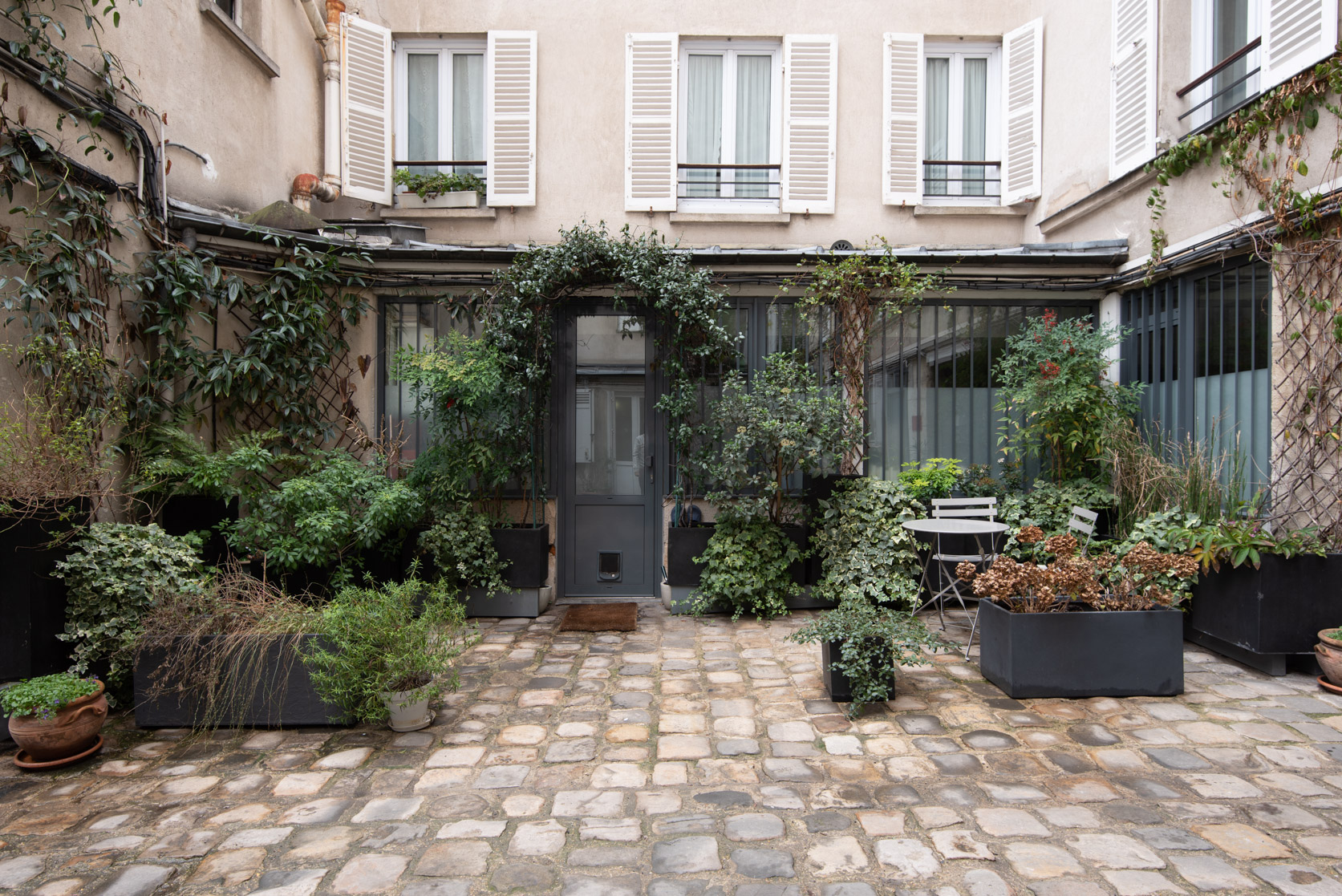 The Ivy Courtyard, Paris, France | Plum Guide