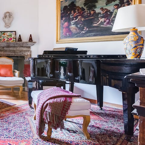 Get around the antique grand piano for a sing-along