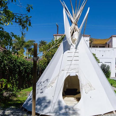 Chill out in the teepee with its plush faux furs