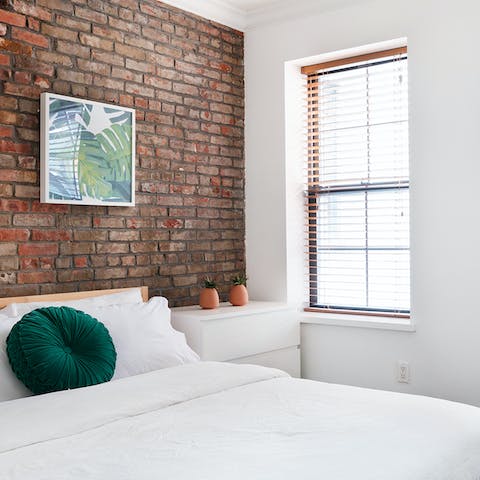 Admire the bare brick walls and NYC-loft style interiors