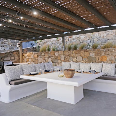 Gather on the outdoor sofas for alfresco drinks with your loved ones