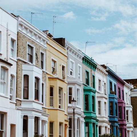 Explore Portobello Road Market, an eight-minute walk away