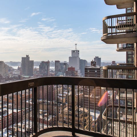 Take in views over Manhattan's skyline from the private balcony