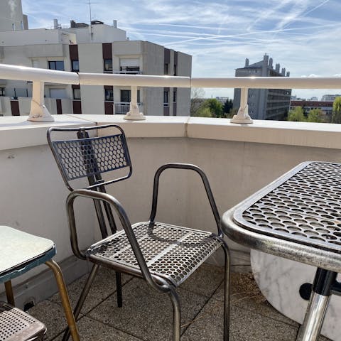 End the day with a glass of wine on the balcony